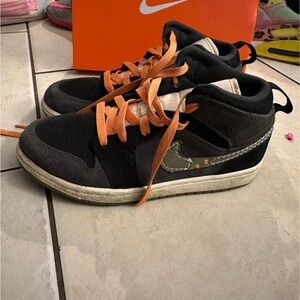 size 3 nike jordan mids. worn a few times but lots of life left in them